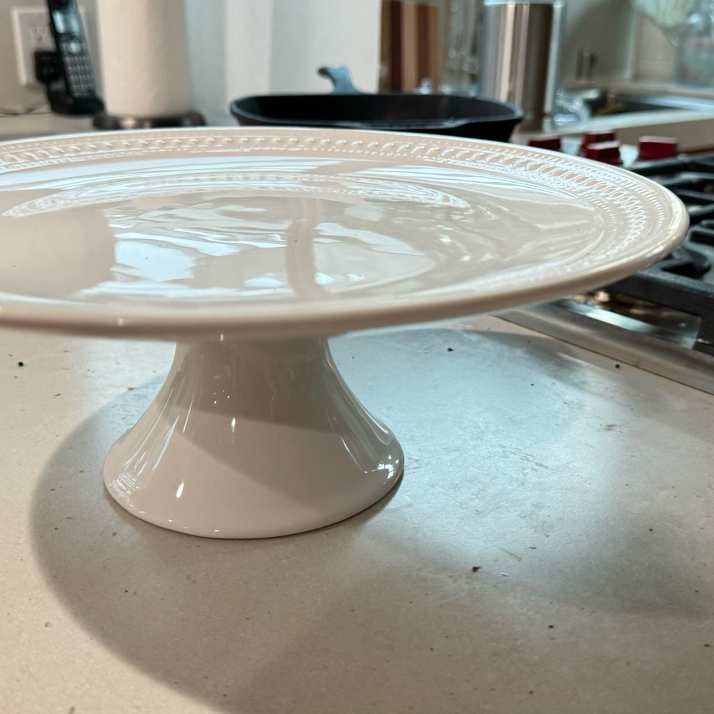 Elegant White Cake Stand-12 inches wide and approximately 5 inch tall.